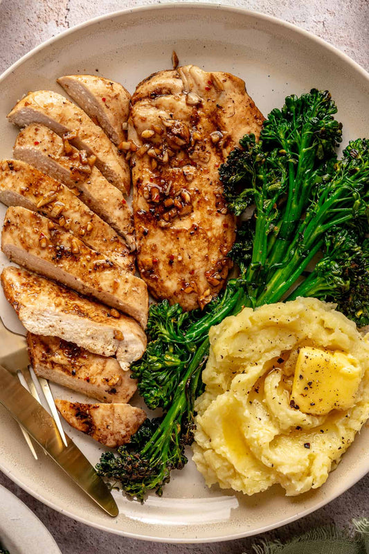 Main -  Thyme and Garlic Chicken on Creamy Mash Potato, Broccolini with Sweet Onion, Pea and Bacon Jus (gf)