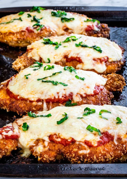 Main Course - Classic Chicken Parmigiana, with Chat Potatoes, Roast Potatoes and peas