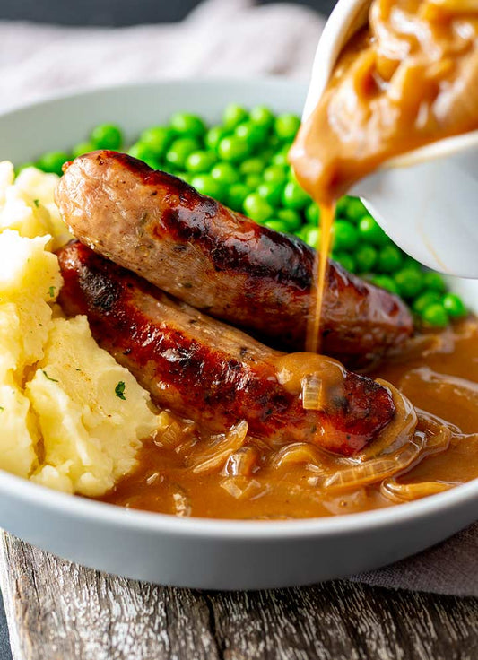 Main - Fat Pork Sausages with Creamy Mash, Peas and Red Onion Gravy